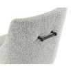 Upholstered grey velvet dining chair with handle on backrest