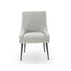 Upholstered grey velvet dining chair with handle on backrest