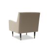 Light brown lounge chair featuring legs of solid wood capped with polished brass cups