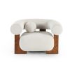 Sand-coloured Bouclé upholstery chair with ball-shaped cushion