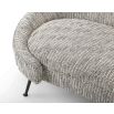 A stylish curved sofa with a gorgeous grey upholstery