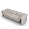 A shapely sofa with a stylish taupe upholstery
