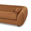 A stylish sofa with two ball scatter cushions and a beautiful boucle upholstery
