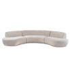 A contemporary sofa by Liang & Eimil with a stylish curved shape and timeless taupe upholstery