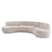A contemporary sofa by Liang & Eimil with a stylish curved shape and timeless taupe upholstery