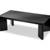 Wide legged dining table in black wood finish with glass top