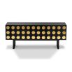 art deco sideboard with repeated geometric circular patterns accented in brushed brass