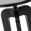 Black and timeless round-topped side table with three legs and scandi silhouette