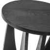 Classic mid-century silhouette side table with curve cut out legs and round top in black wood finish