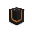Black cube-shaped side table with elegant streak of natural wood