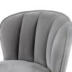 Art-deco inspired bar stool in grey velvet with fluting details and brass accents