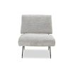 Grey upholstered armchair with rolled back