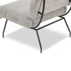 Grey upholstered armchair with rolled back