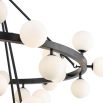Matte black light with layered round frame and scattered round glass orbs
