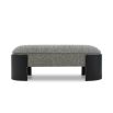Rounded silhouette bench in grey upholstery