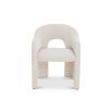 Arched dining chair completely upholstered in divine cream fabric