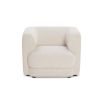 Simple silhouette armchair with low back and cream upholstery