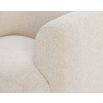 Simple silhouette armchair with low back and cream upholstery