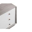 A luxury chest of drawers with a grey and white wood finish