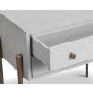 A luxury bedside table with a grey and bronze finish