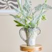 Elevate your decor with the Ledger Vase. Its modern design and elegant finish make it perfect for any setting, adding a touch of sophistication.