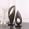 Coffee-coloured marble candle holder with cut-out design