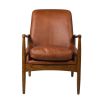 Luxurious mid-century style armchair with rust coloured leather seat 