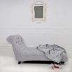 Luxurious deep buttoned, no arm chaise longue with continuous line design 