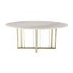 White marble top dining table with brass geometric legs