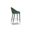 Emerald velvet upholstered bar chair with buttoning details and brass capped feet