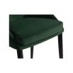 Emerald velvet upholstered bar chair with buttoning details and brass capped feet