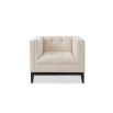 A sophisticated armchair by Liang & Eimil with a neutral upholstery and buttoned design