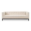 A luxury sofa by Liang & Eimil with a sophisticated design and beautiful beige upholstery