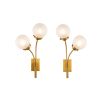 Brass wall fixture with two splayed orb lights