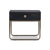 Black bedside table with brass handle and brass legs