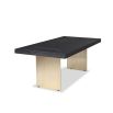 Dining table with rectangular brass legs and stylish top of figured black ash veneer