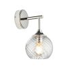 Wall sconce with singular twisted glass globe and nickel fixture