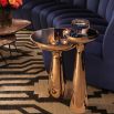 Sleek low gold side table with black glass table top