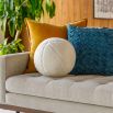 Cosy up with our Bola Fleece Cushion! The ultra-soft design offers comfort and style for your living space. Perfect for snuggling or decorating!