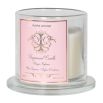 A luxurious scented candle with a grapefruit fragrance