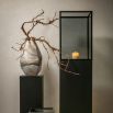 Black cube plinth for displaying hurricanes or vases