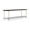 A luxurious contemporary metal and marble console table with a tinted glass top