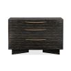 An opulent dresser by Caracole with an ebony finish and golden hardware