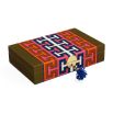 A bold jewellery box by Jonathan Adler with a geometric pattern and luxury blue velvet lining 