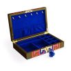 A bold jewellery box by Jonathan Adler with a geometric pattern and luxury blue velvet lining 