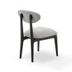 A statement dining chair with a gorgeous grey upholstery