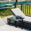 A stylish sun lounger from Willow's Outdoor collection with a bespoke sunbrella upholstery