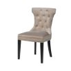 A stylish taupe velvet dining chair with studding and deep buttons 