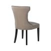 A stylish taupe velvet dining chair with studding and deep buttons 