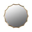 A glamorous early-century-inspired wall mirror in a golden finish